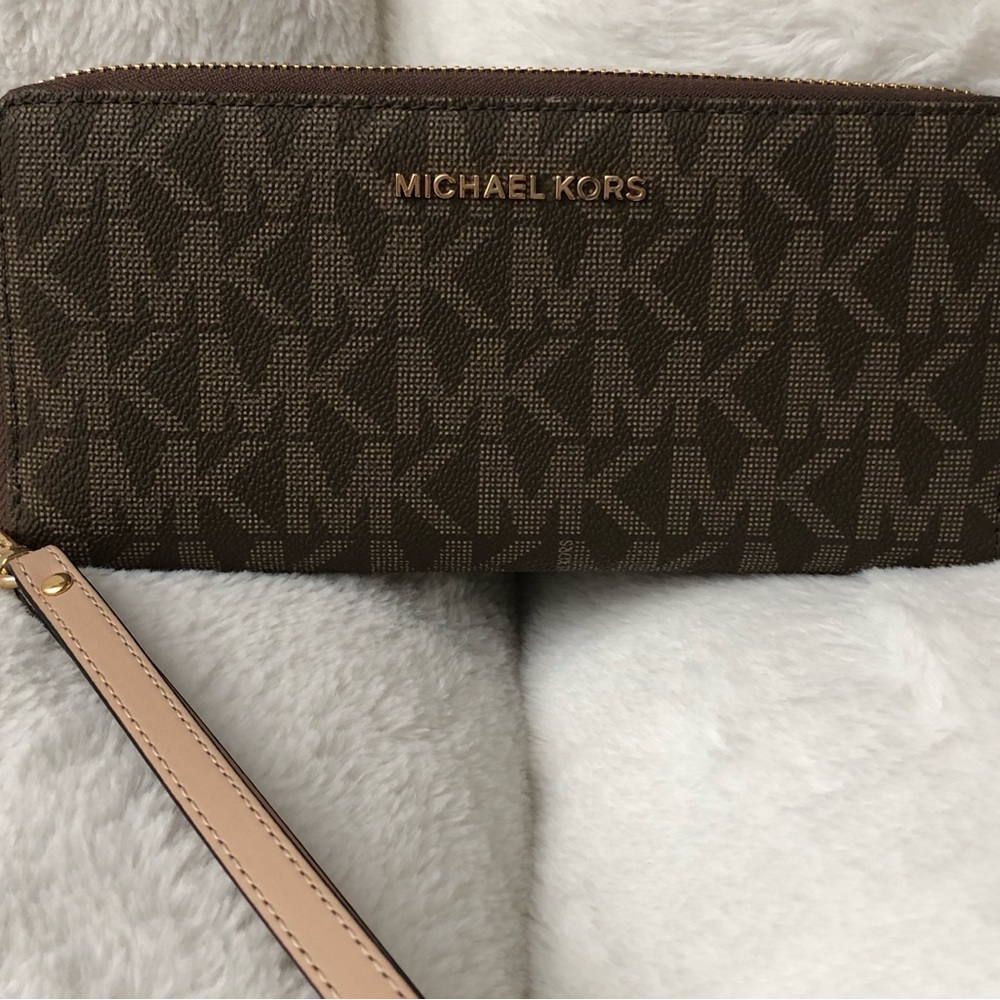 Michael Kors Wrislet Long Zippy Wallett.  Brand new and never used.
